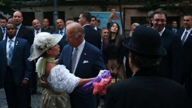 US Vice President Joe Biden dances with street actress Ljiljana jaksic known by her professional name Salveta