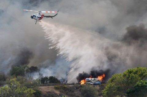 Thousands Flee Homes In Southern California As Fire Rages Out Of Control