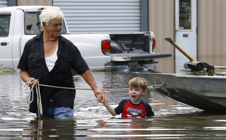 Louisiana waters rise: 'Praying it stops'