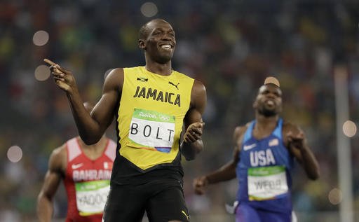 Jamaica's Usain Bolt wins a men's 200-meter semifinal during the athletics competitions of the 2016 Summer Olympics at the Olympic stadium in Rio de Janeiro Brazil Wednesday Aug. 17 2016