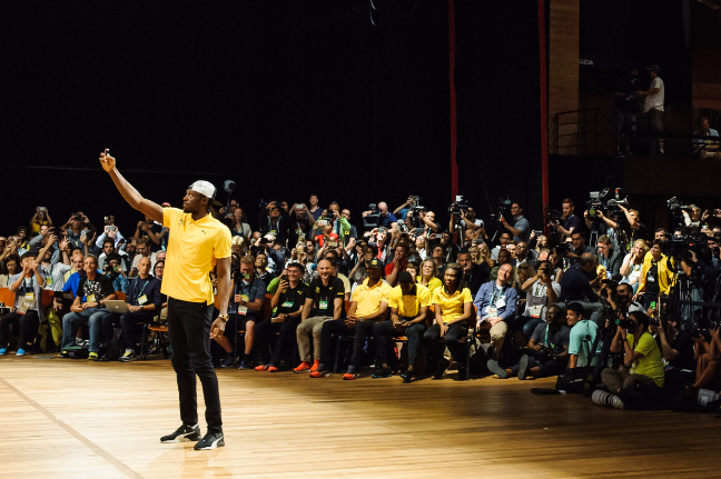 Bolt take a selfie with the media at Cidade das Artes