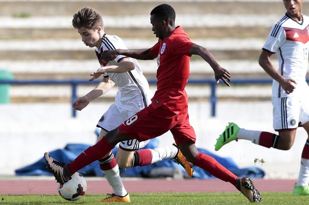 Joshua Bohui challenges Davide Jerome Itter during the UEFA Under17 match between England and Germany