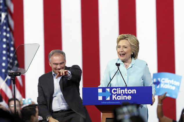 Democratic presidential candidate Hillary Clinton is joined by Sen. Tim Kaine D-Va. as she speaks at a rally at Florida International University Panther Ar