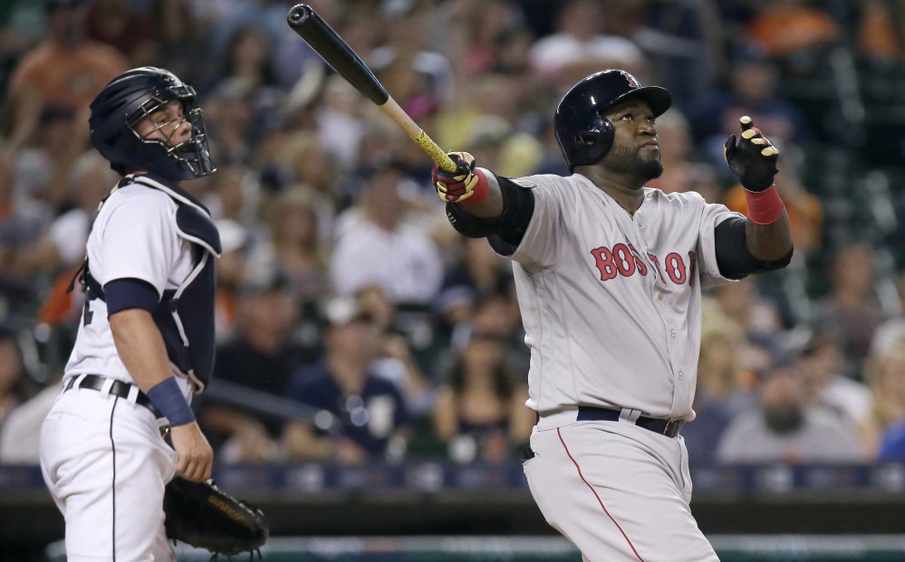 David Ortiz of the Boston Red Sox and Detroit catcher James Mc Cann watch Ortiz's two-run homer in the fifth inning Saturday night that helped produce a 3-2 victory