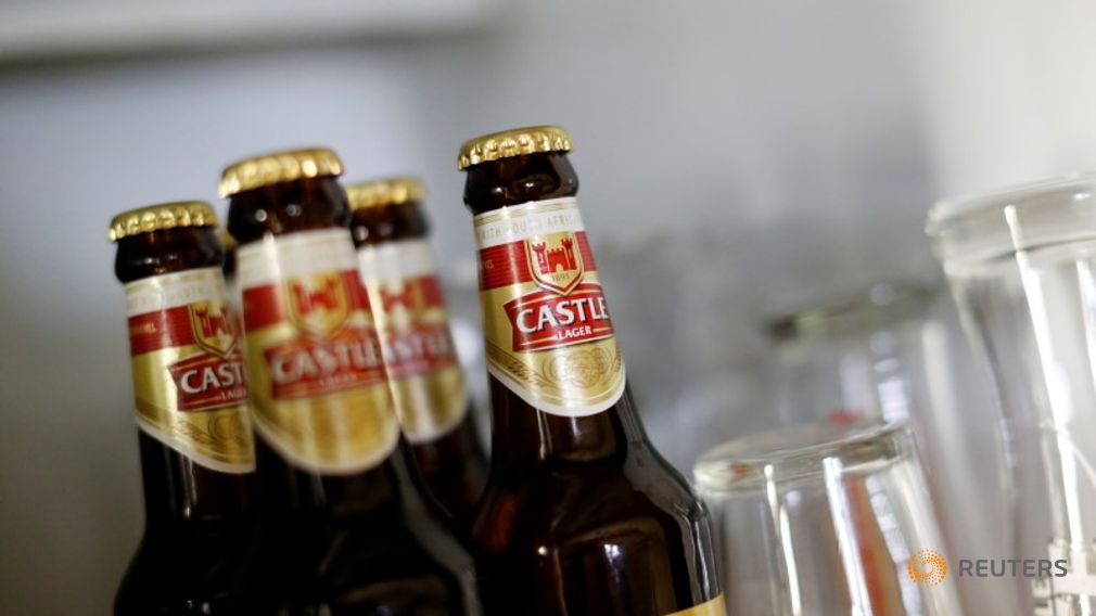 Bottles of SABMiller's flagship brew Castle Lager are seen at a bar in Cape Town South Africa