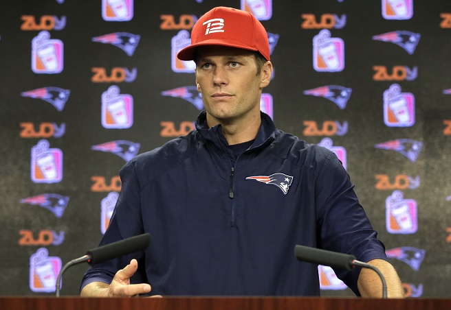 New England Patriots quarterback Tom Brady takes questions from members of the media during a news conference before a scheduled NFL football training camp practice Tuesday Aug. 23 2016 in Foxborough Mass. Brady says he's ready to play after a's