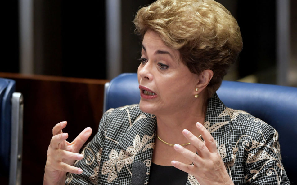 Suspended Brazilian President Dilma Rousseff answers to questions during her impeachment trial at the National Congress in Brasilia