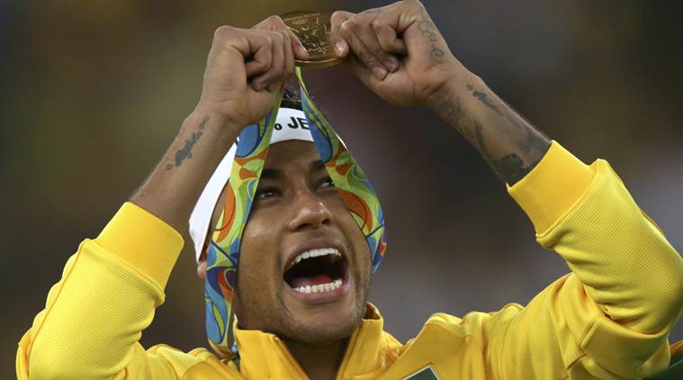 2016 Rio Olympics- Soccer- Victory Ceremony- Men's Football Tournament Victory Ceremony- Maracana- Rio de Janeiro Brazil- 20/08/2016. Neymar of Brazil poses with his gold medal. REUTERS  Ueslei Marcelino FOR EDITORIAL USE ONLY. NOT FOR SALE FO