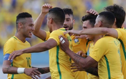 BrazilliBrazillian playmaker Neymar Junior celebrates after scoring his penalty