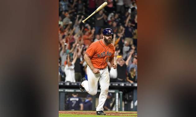 Houston Astros designated hitter Evan Gattis rounds the bases on his game-winning home run in the ninth inning of a baseball game against the Tampa Bay Rays Friday Aug. 26 2016 in Houston. Houston won 5-4