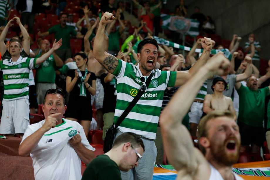 Celtic fans cheer before the the Champions League qualifying playoffs second leg soccer match in against Hapoel in Beersheba Israel Tuesday Aug. 23 2016