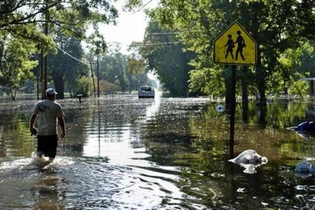 Gonzales Louisiana. As many as 30,000 people have been rescued following unprecedented floods in the southern US state of Louisiana including a 78-year-old woman who spent a