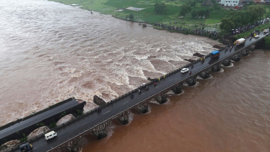 The scene at a bridge collapse in Maharashtra where 22 bus passengers are missing