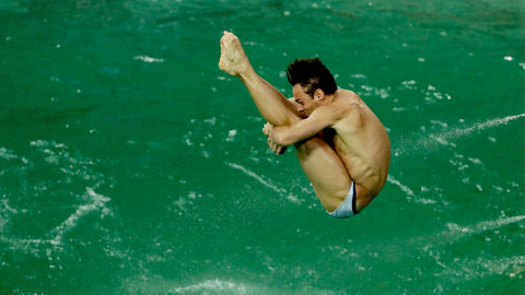 Brit Tom Daley takes part in a training session after the water in the diving pool turned green