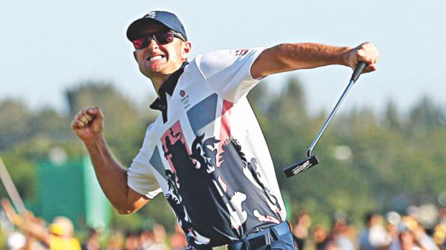 Britain's Justin Rose celebrates his gold medal win in the men's golf at the Olympic golf course on Sunday