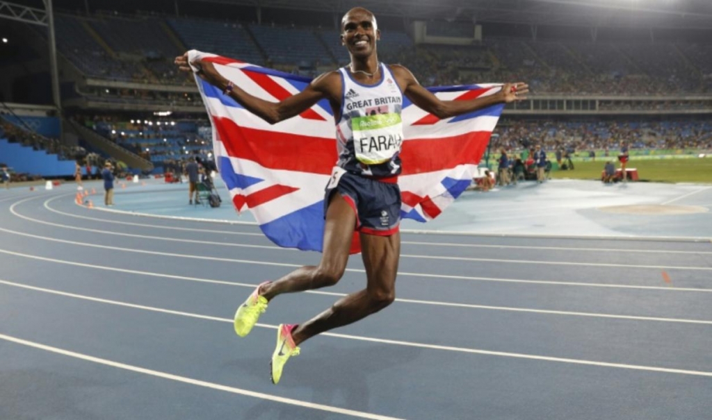 Britain's Mo Farah celebrates winning the Men's 5000m Final