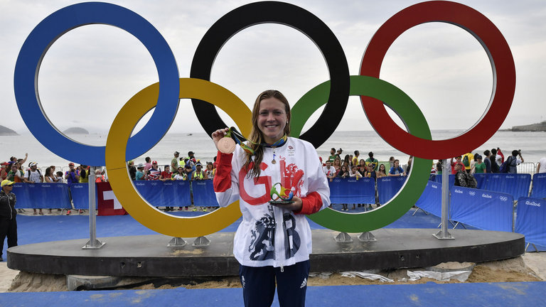 Britain's Vicky Holland celebrates with her bronze medal