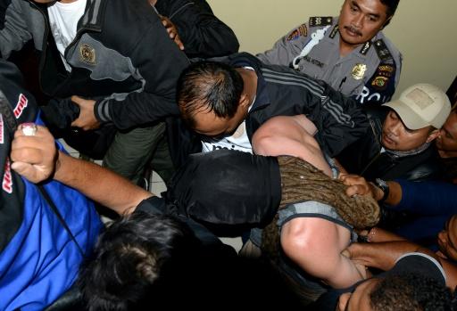 Briton Australian held over Bali policeman s murder