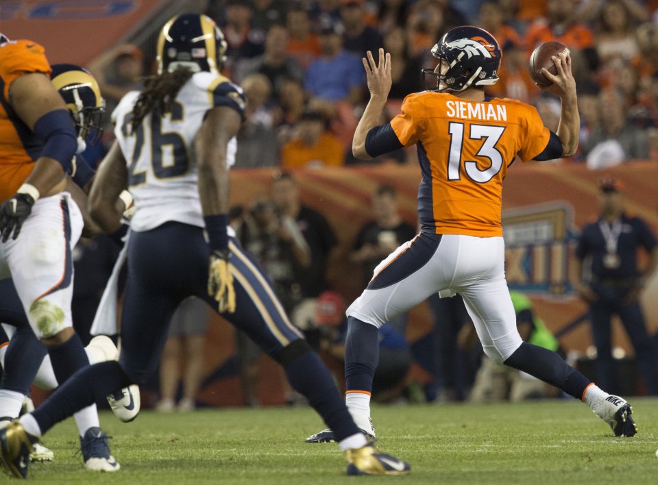 Trevor Siemian throws down field against the Rams during the second quarter Saturday Aug. 27 2016 at Sports Authority Field at Mile High in Denver