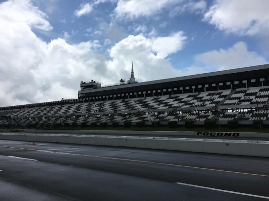 Pocono Raceway was sun drenched on Saturday but rain and fog played a part in Chris Buescher's first Sprint Cup Series win on Monday