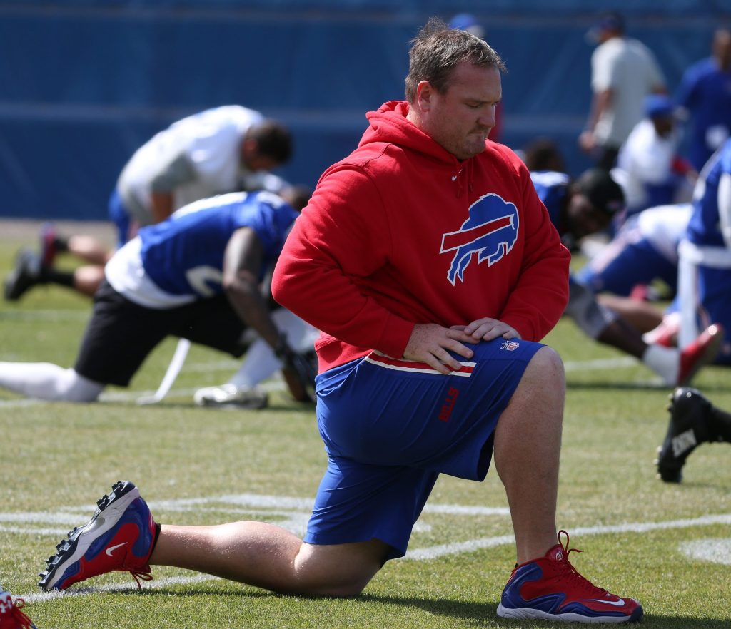 Buffalo Bills defensive tackle Kyle Williams stretches during Bills mandatory minicamp.			
		James P. McCoy Buffalo News