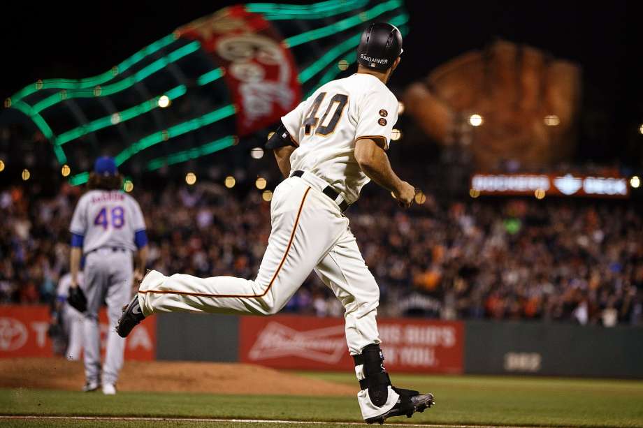 Madison Bumgarner watches his two-run homer in the fourth inning sail out of AT&T Park