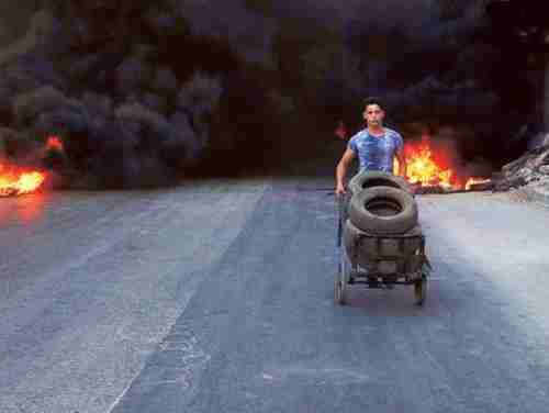 Burning tires in Aleppo to create a'no-fly zone