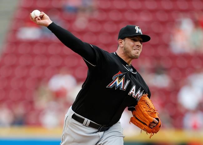 Miami Marlins starting pitcher Jose Fernandez throws against the Cincinnati Reds during the first inning of a baseball game Thursday Aug. 18 2016 in Cincinnati