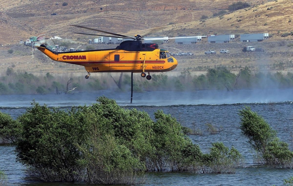 Latest: Fire crews make progress in California blaze