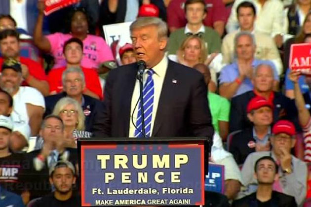 Republican presidential candidate Donald Trump addresses supporters during a campaign rally at Silver Spurs Arena inside the Osceola Heritage Park in Kissimmee Florida on Au. 11 2016