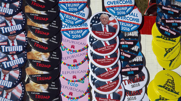 Campaign buttons supporting US Republican presidential candidate Donald Trump are displayed before a rally. 
 Reema Khrais