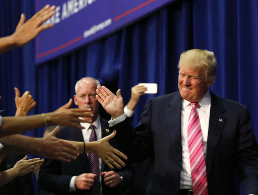 Republican presidential candidate Donald Trump arrives to speak at a campaign rally in Fredericksburg Va. Saturday Aug. 20 2016