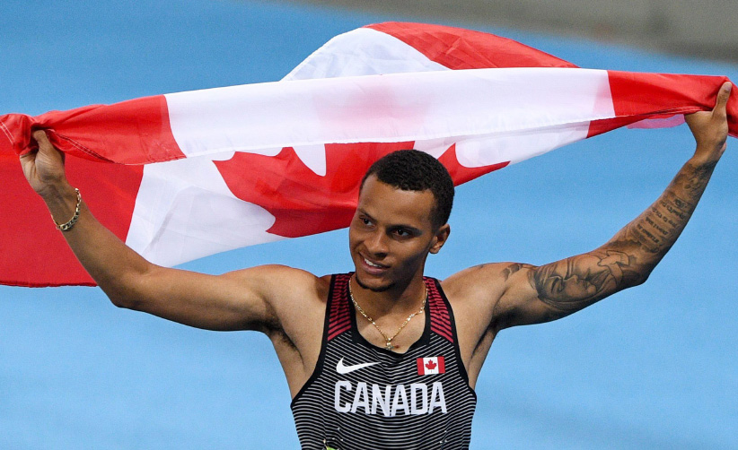 Canada's Andre De Grasse celebrates silver in the men's 200m final