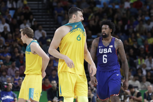 Australia's Andrew Bogut reacts to a call as he walks up court with United States De Andre Jordan during a men's basketball game at the 2016 Summer O