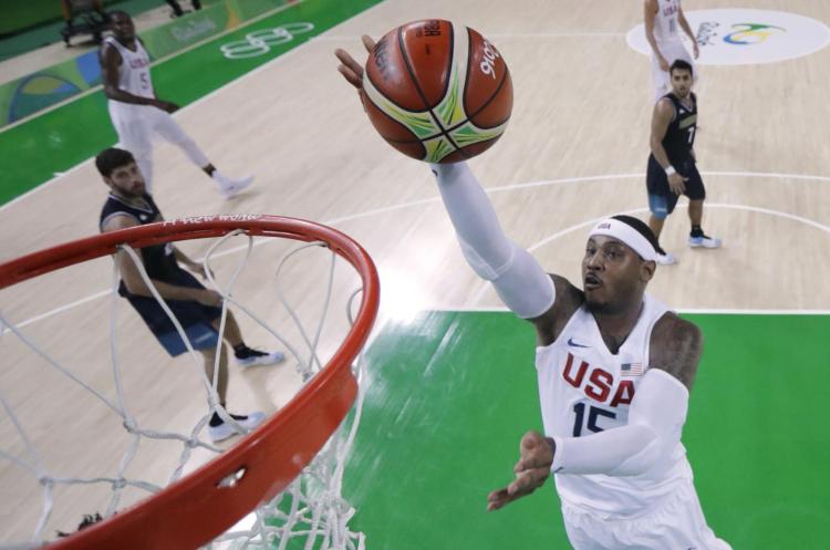 Carmelo Anthony drops in a lay up as the U.S. basketball erases any doubts about their vulnerability