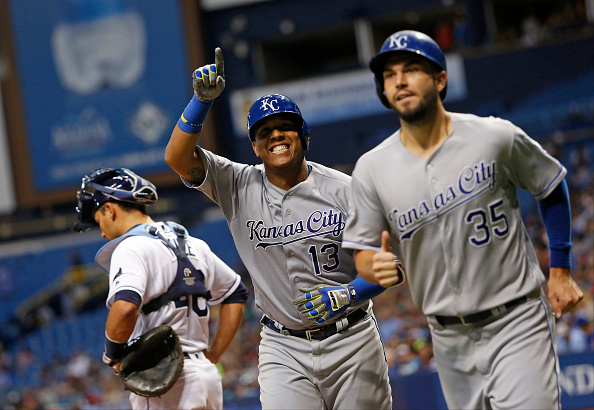 ST. PETERSBURG FL- AUGUST 2 Salvador Perez #13 of the Kansas City Royals and teammate Eric Hosmer #35 celebrate behind catcher Luke Maile #46 of the Tampa Bay Rays as they make their way to the dugout after both scoring off of a two-run home run by Pe