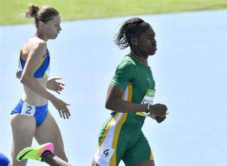 South Africa's Caster Semenya right and Romania's Claudia Bobocea compete in a women's 800-meter heat during the athletics competitions of the 2016 Summer Olympics at the Olympic stadium in Rio de Janeiro Brazil Wednesday Aug. 17 2016