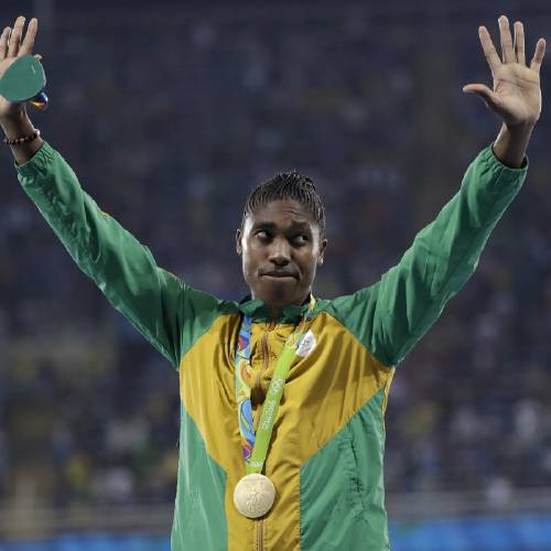 Caster Semenya waves wearing her gold medal for the women's 800-meter final during an athletics podium ceremony at the Summer Olympics inside Olympic stadium in Rio de Janeiro Brazil Saturday Aug. 20 2016. (AP