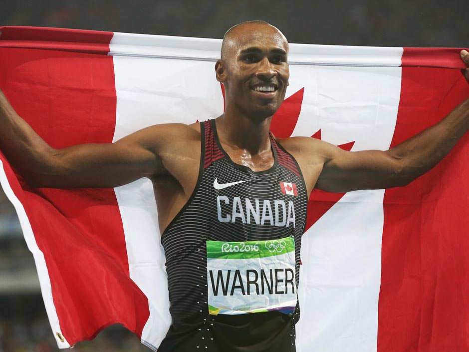 Damian Warner of Canada celebrates his bronze medal in the decathlon at the 2016 Summer Olympics in Rio de Janeiro on Aug. 18 2016