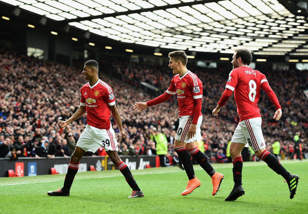 MANCHESTER ENGLAND- FEBRUARY 28 Marcus Rashford of Manchester United celebrates scoring his opening goal during the Barclays Premier League match between Manchester United and Arsenal at Old Trafford