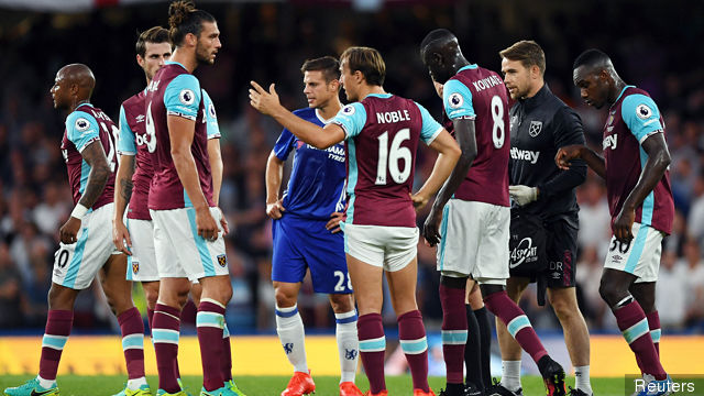 West Ham United's Andre Ayew goes off injured as Mark Noble talks to Andy Carroll