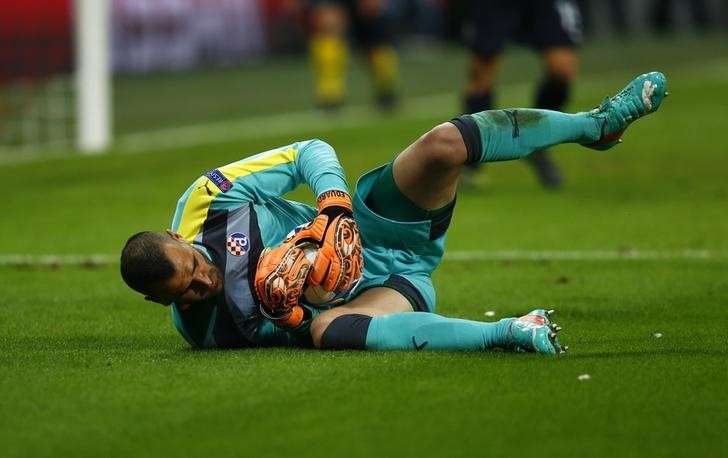 Dinamo Zagreb's Eduardo makes a save during their Champions League Group F soccer match against Bayern Munich in Munich Germany