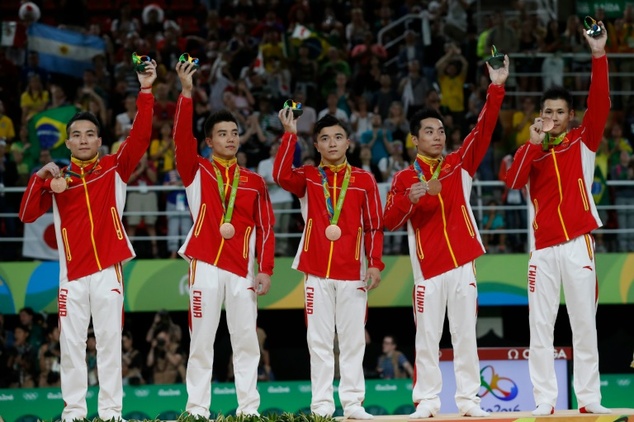 China's Deng Shudi Lin Chaopan You Hao Liu Yang and Zhang Chenglong pose with their bronze medals in Rio