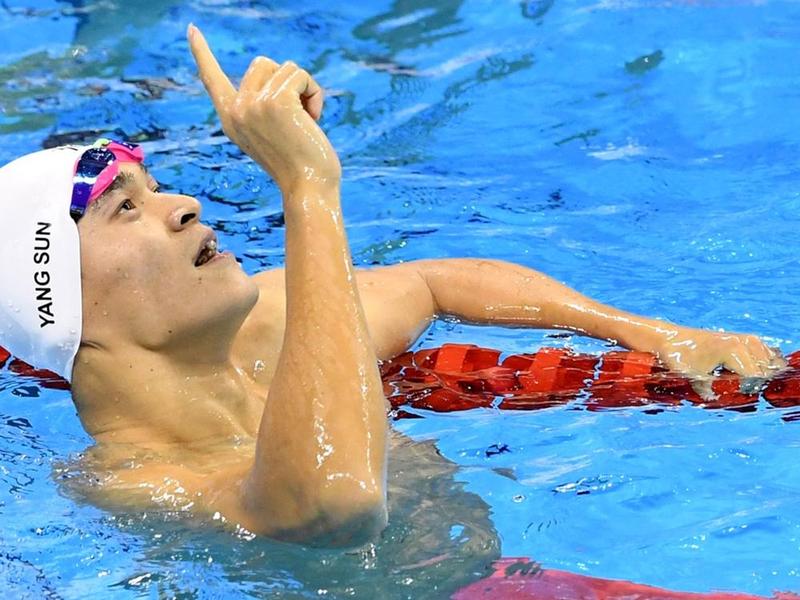 China's Sun Yang celebrates after winning