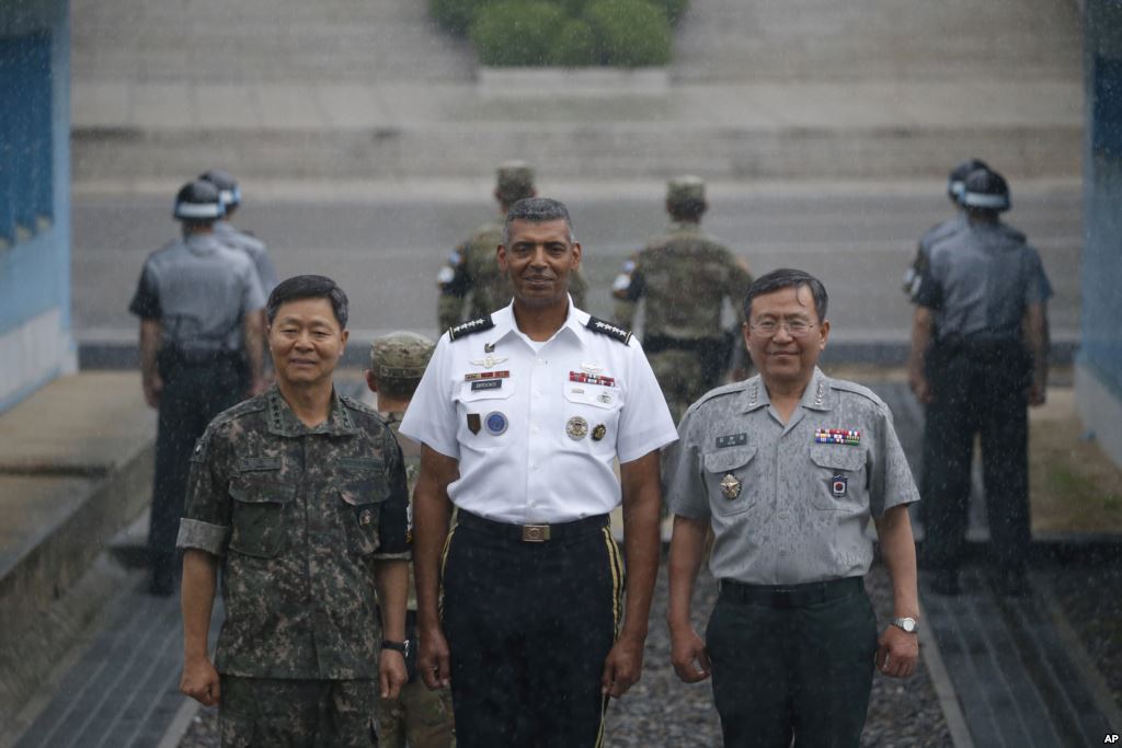 Commander of the United Nations Command Combined Forces Command and United States Forces Korea General Vincent K. Brooks, center poses for