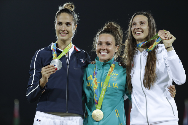 Silver medalist Elodie Clouvel of France gold medalist Chloe Esposito of Australia and bronze medalist Oktawia Nowacka of Poland from left to right pose