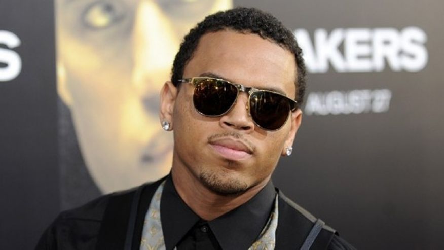 Actor and singer Chris Brown arrives at the premiere of'Takers in Los Angeles California