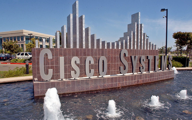 ASSOCIATED PRESS           Cisco Systems Inc. headquarters in San Jose Calif. is shown in Aug. 2003. The networking company today said it will cut approximately 5,500 jobs as part of a restructuring plan that said was necessary