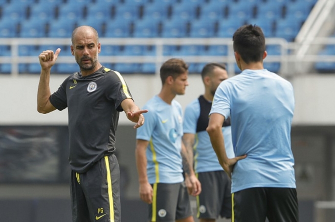 City head coach Pep Guardiola during training