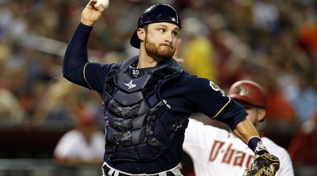 Jul 24 2015 Phoenix AZ USA Milwaukee Brewers catcher Jonathan Lucroy turns the double play while avoiding Arizona Diamondbacks right fielder Ender Inciarte in the third inning at Chase Field. Mandatory Credit Rick Scuteri-USA TODAY Sports